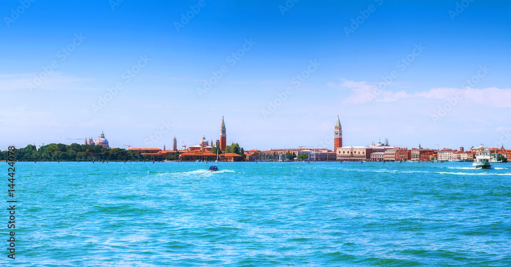 Panoramic cityscape beautiful ancient town. Venice, laguna view on Piazza San Marco with Campanile, Doge Palace. Venice, Italy. Panoramic cityscape beautiful ancient town. Venice, laguna view on Piazza San Marco with Campanile, Doge Palace. Venice, Italy.