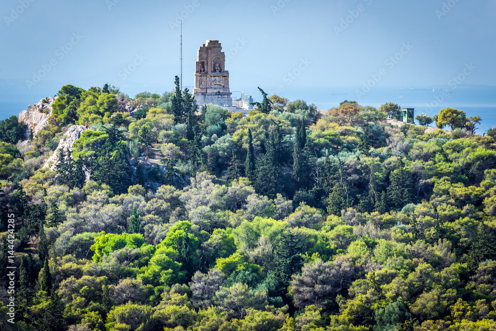 Monument of Philopappos on Musaios Hill seen from Acropolis hill in Athens, Greece