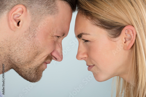 Couple Looking Angrily At Each Other