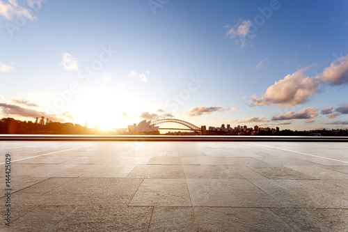 Canvas Print empty floor with bridge and cityscape of modern city