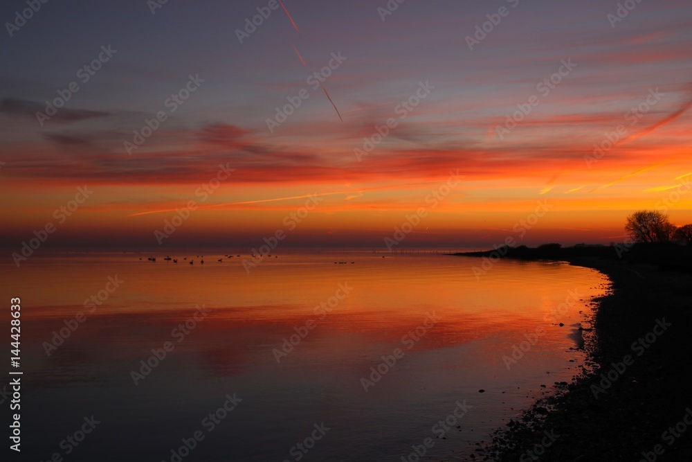 Beautiful colors at the beach after sunset in February Beautiful colors at the beach after sunset in February