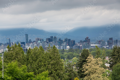 Vancouver Under Storm Clouds From Hills