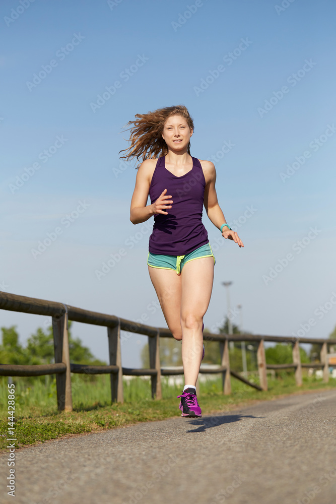 Running woman Outdoor Workout in a Park