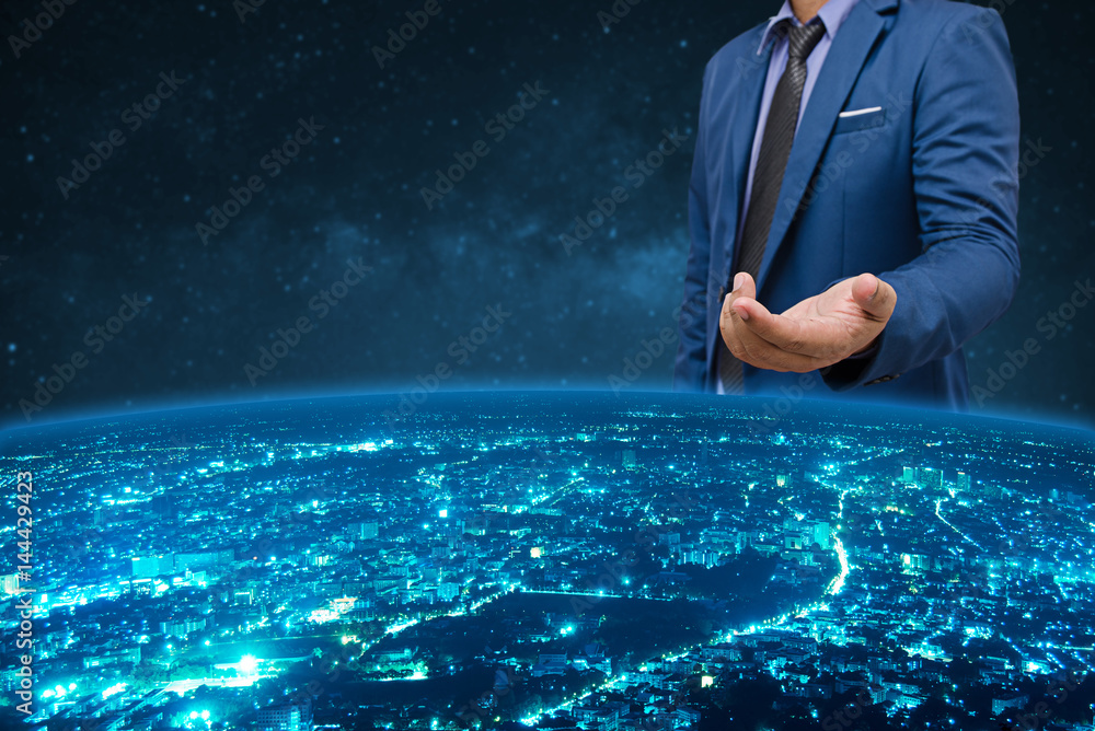 Fototapeta premium businessman in blue suite with welcome hand over the world