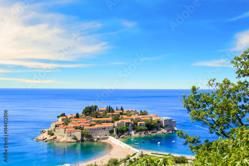 Beautiful view of the island-resort of St. Stefan (Sveti Stefan) on the Budva Riviera, Budva, Montenegro on a sunny day