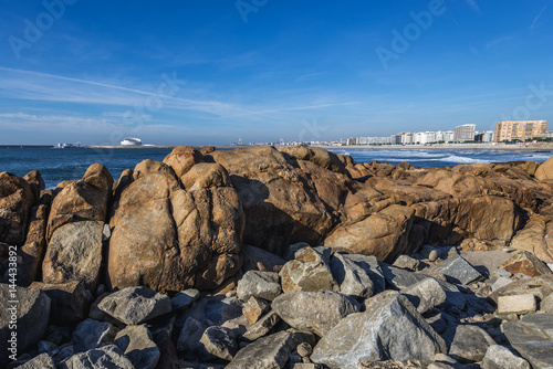 Rocky beach of Atlantic Ocean in Porto, Portugal photo