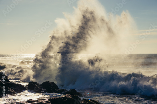 Big waves on Atlantic Ocean seen from beach in Porto, Portugal