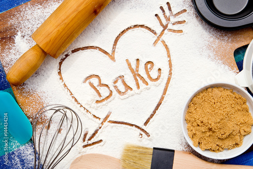 Baking - Bake with Heart - written in flour

