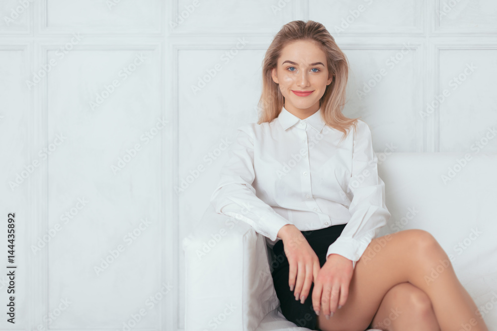 Portrait of beautiful young woman working in the office. Portrait of beautiful young woman working in the office.