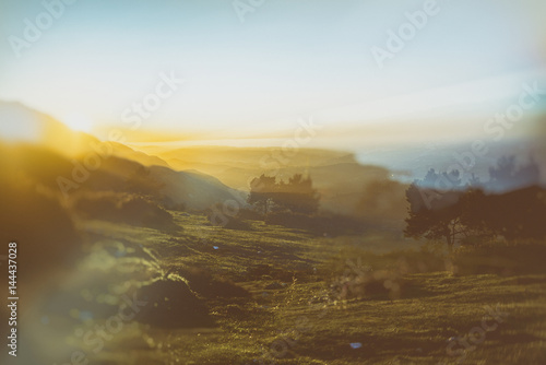 Abstract double exposure mountain sunset and nature concept - analog vintage look