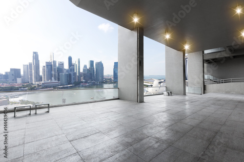 empty floor with cityscape of modern city
