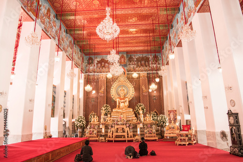 Buddhist faithful inside Wat Chanasongkhram Ratchaworamahawihan (Wat Chana Songkhram), Bangkok