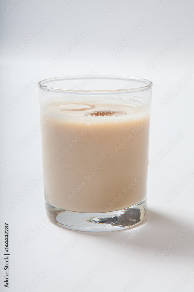 milk cocktail with a cherry in a tall glass milk cocktail with a cherry in a tall glass