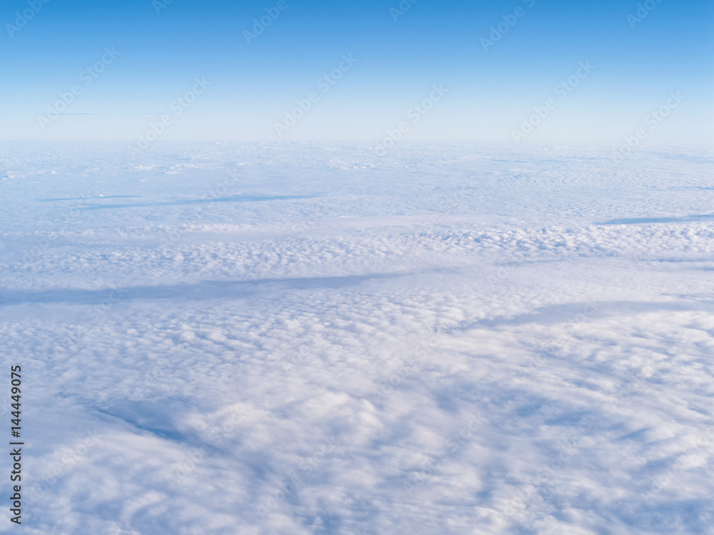 clouds. view from the window of an airplane flying above the clouds.