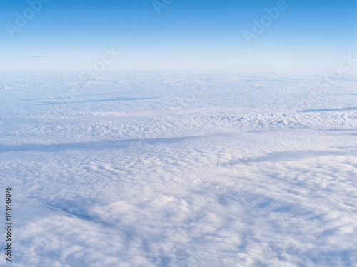 clouds. view from the window of an airplane flying above the clouds.
