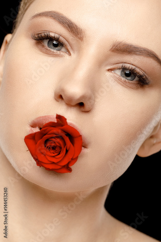 woman with red rose