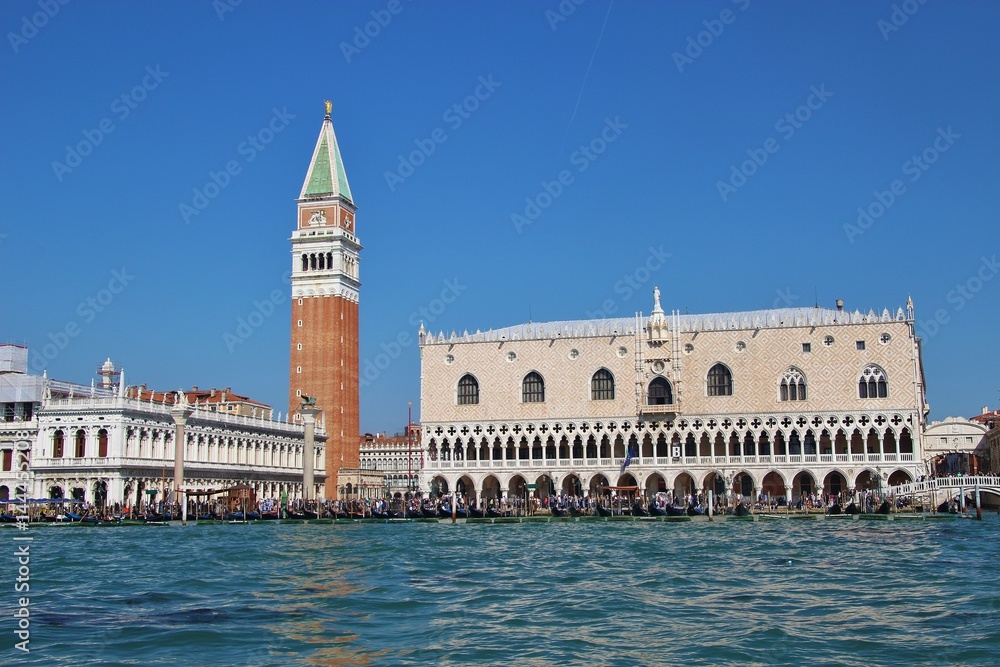 Panoramic view of Saint Mark's square in Venice: The bell tower or Campanile of the Basilica Saint Mark and the Doge's palace. Italy, Europe.
