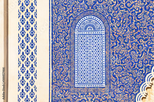 Traditional Moroccan Patterns on Bab Boujloud, or the Blue Gate of Fes in Morocco photo