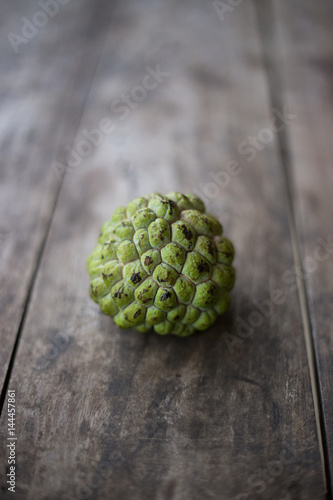 A Custard or Sugar Apple on a Table