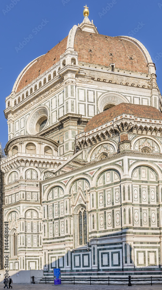 Magnificent vertical view from below of the Duomo in Florence, Italy, on a sunny day