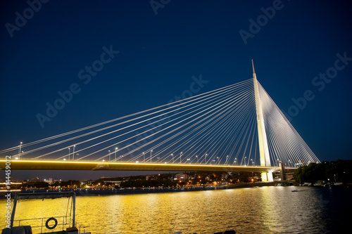 Abstract image - Suspension Bridge night lights. Dusk Skyline