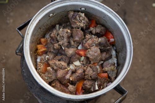 Preparing Goat Stew in a Malawian Village, Africa