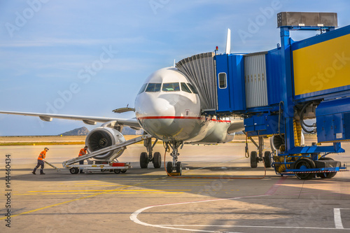 Passenger jet airplane at airport gate