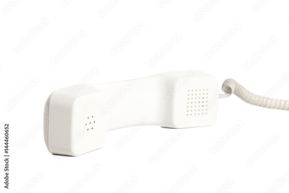 Telephone receiver and cord on white background. Telephone receiver and cord on white background.