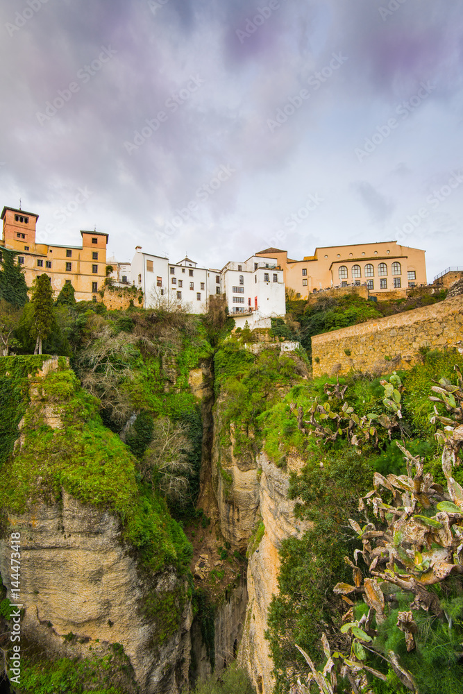 Houses hanging from cliffs in Ronda, Spain