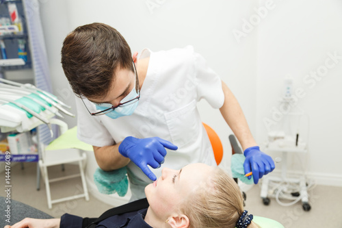 Young woman on examination at the dentist