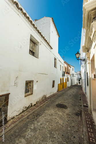 Narrow street in Tarifa, Spain © marcin jucha