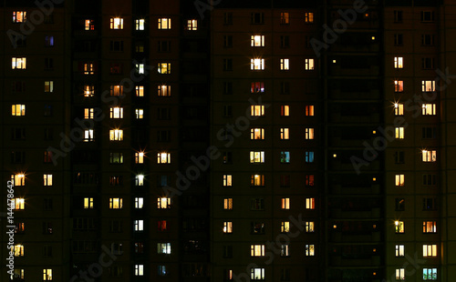 The light in the windows of an municipal building by night