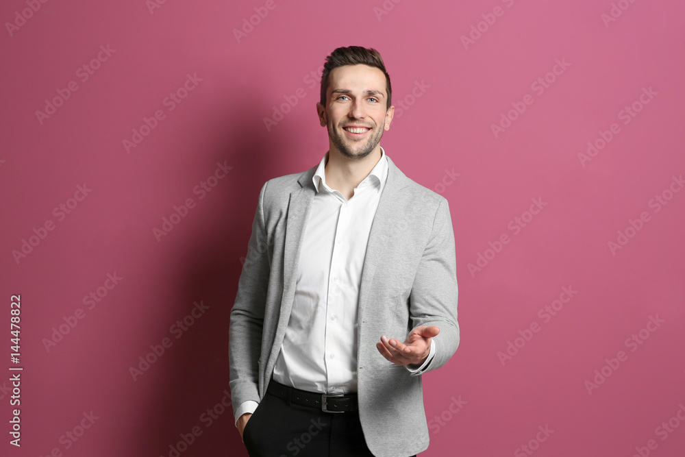 Young handsome man on color background Young handsome man on color background