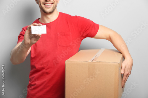 Handsome courier with busin...