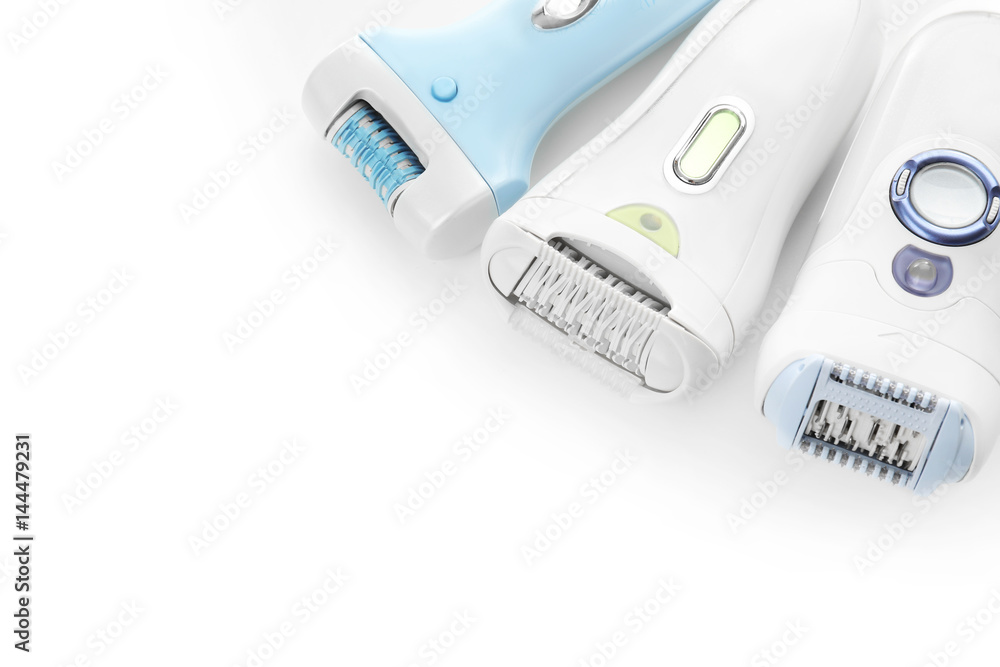Modern epilators on white background Modern epilators on white background