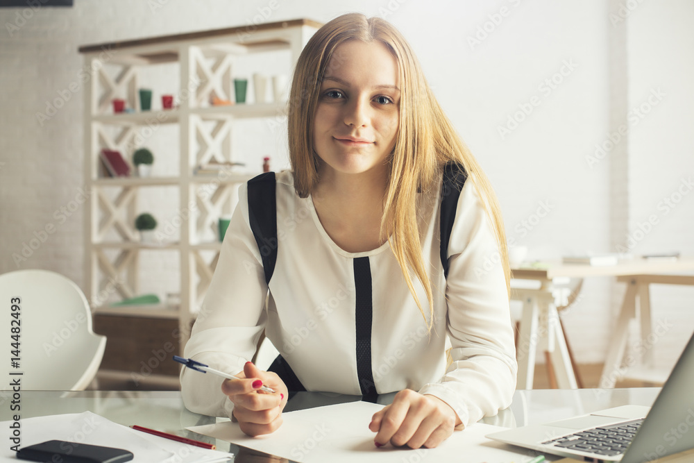 Attractive girl doing paperwork Attractive girl doing paperwork