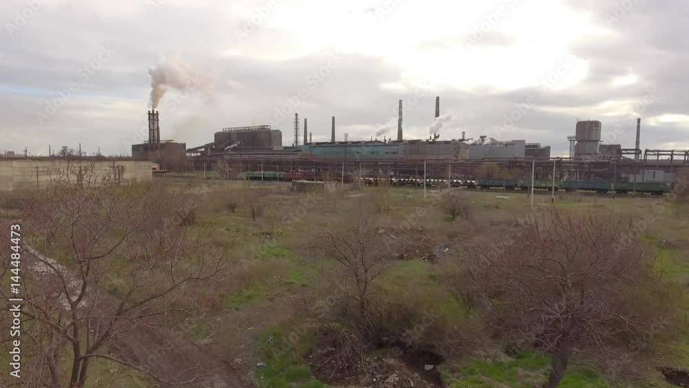 Aerial view of industrial steel plant. Aerial sleel factory. Flying over smoke steel plant pipes. Environmental pollution. Smoke. Aerial view of industrial steel plant. Aerial sleel factory. Flying over smoke steel plant pipes. Environmental pollution. Smoke.