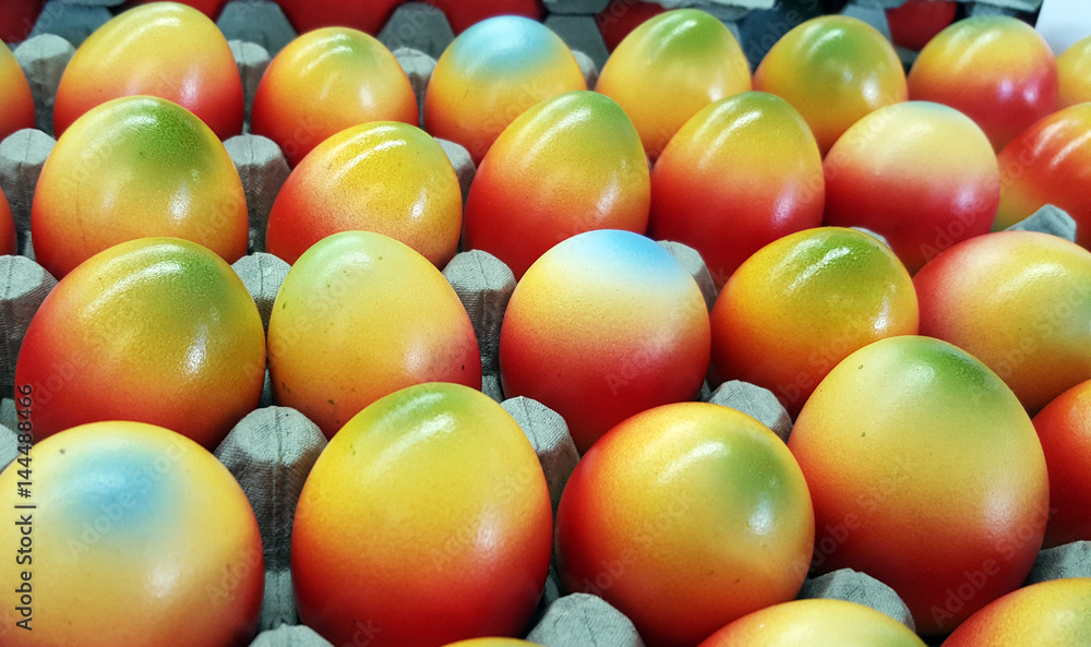 Colorful easter eggs in carton Colorful easter eggs in carton