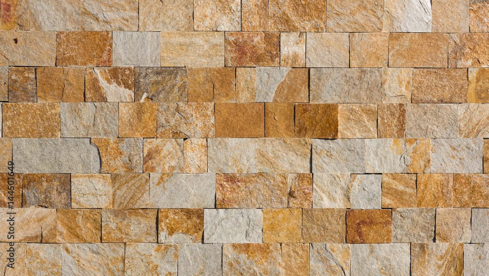 Naklejka premium abstract part of an old fence of stone