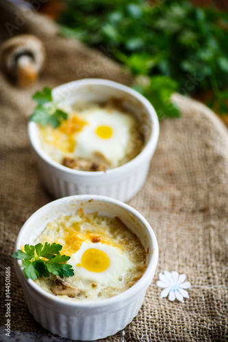 Baked egg with minced fish and mushrooms