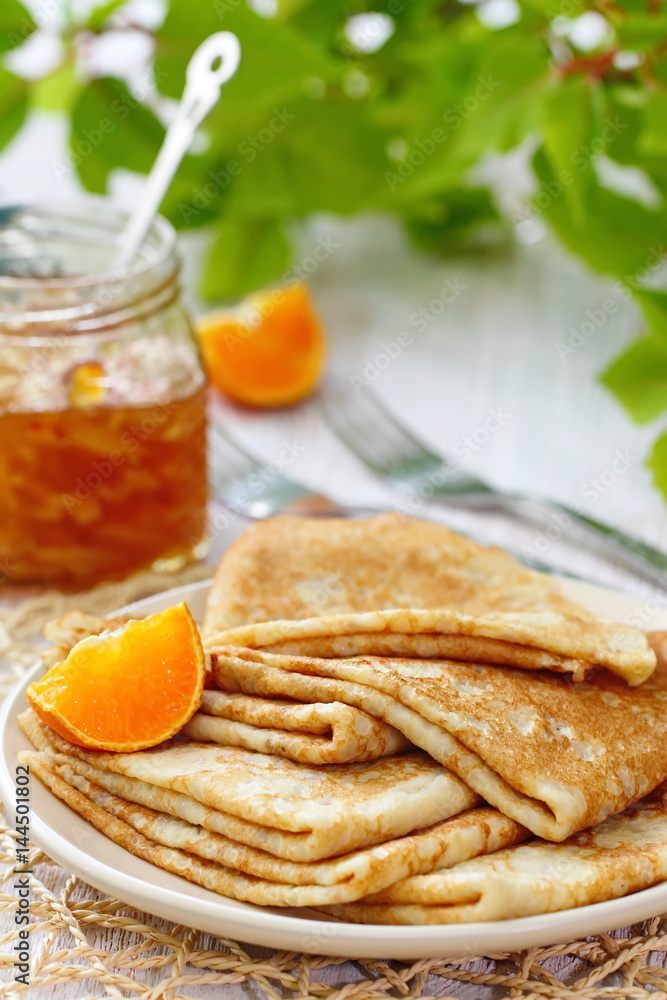 Pancakes with orange jam and fruit Pancakes with orange jam and fruit