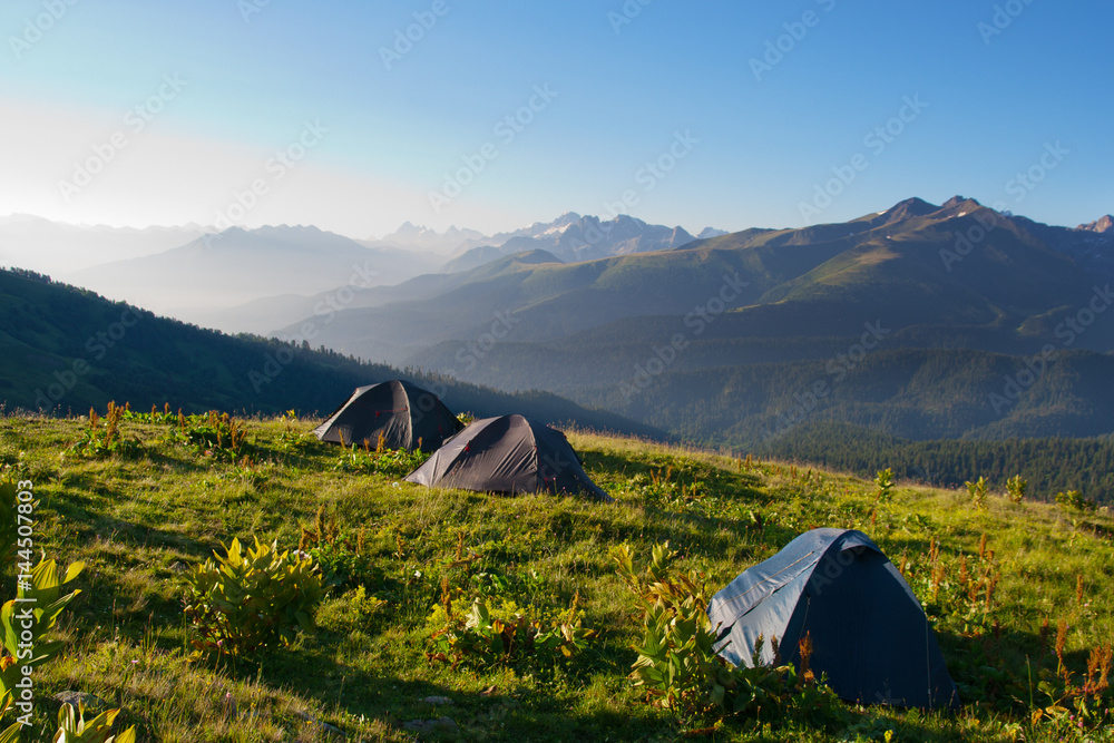 Tourist tent on alpine meadow in the West Caucasus.