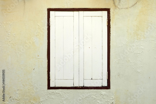 Old Window on Grunge Cement Wall Background.