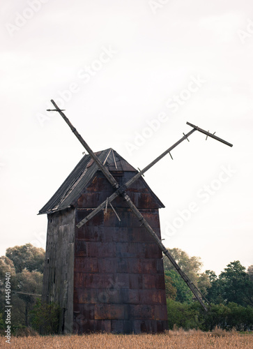 Kawnice, Poland. Old ruined windmill on the field. © morissfoto