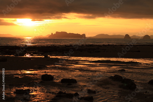 Wallpaper Mural Fantastic big rocks and ocean waves at golden sundown time , tropical holidays - amazing beaches with Longtail boat at famous sunny Long Beach, Krabi Thailand, Andaman sea Torontodigital.ca