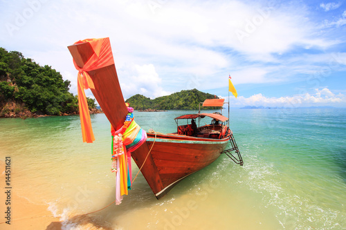 tropical holidays - amazing beaches with Longtail boat at famous sunny Long Beach, Krabi Thailand, Andaman sea © sittinan