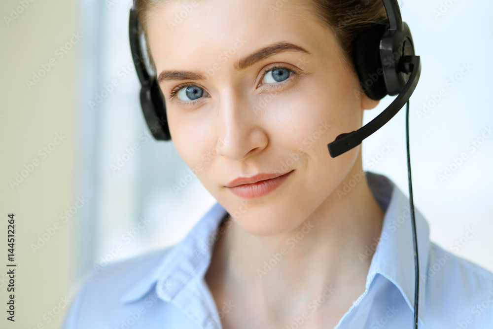 Call center operator. Portrait of beautiful business woman in headset. Call center operator. Portrait of beautiful business woman in headset.