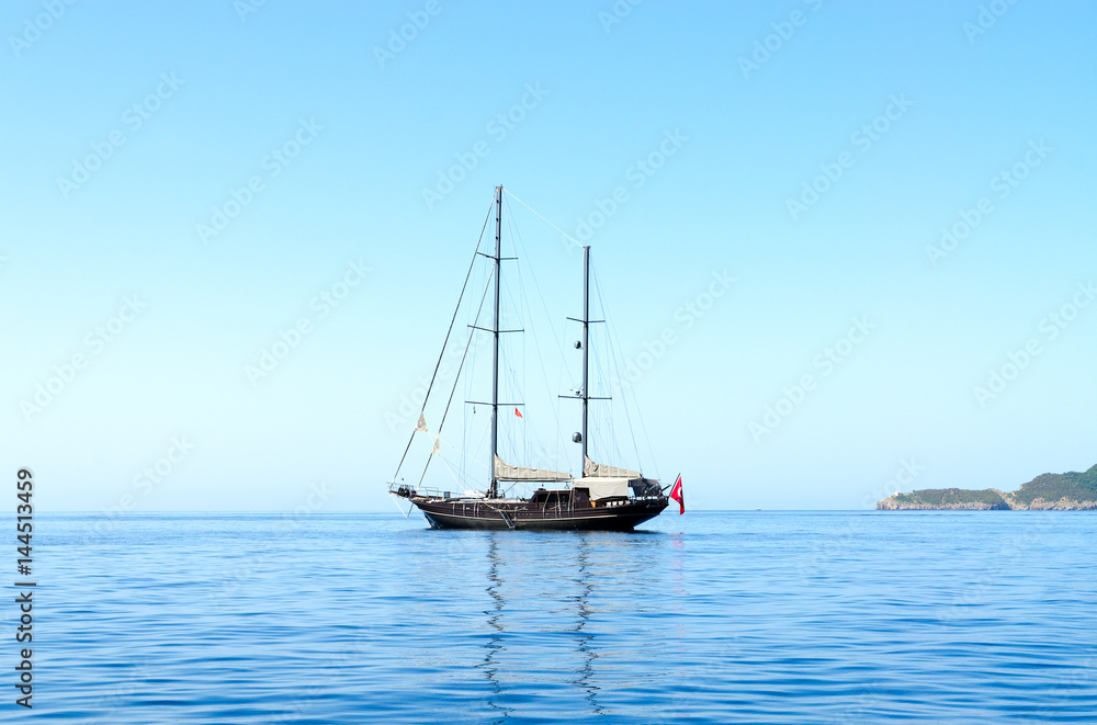 Yacht in sea near Budva coast, Montenegro