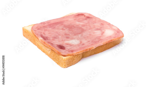 sliced white bread with ham sandwich on white background