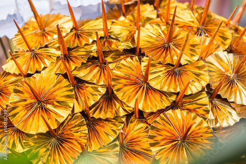 Golden paper flower for praying Pagoda, Mae Sot, Tak, Thailand photo